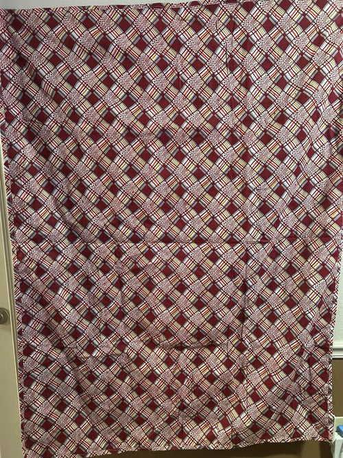 A vintage handmade quilt crafted on Fort Dodge Army Base by military wives 1970's