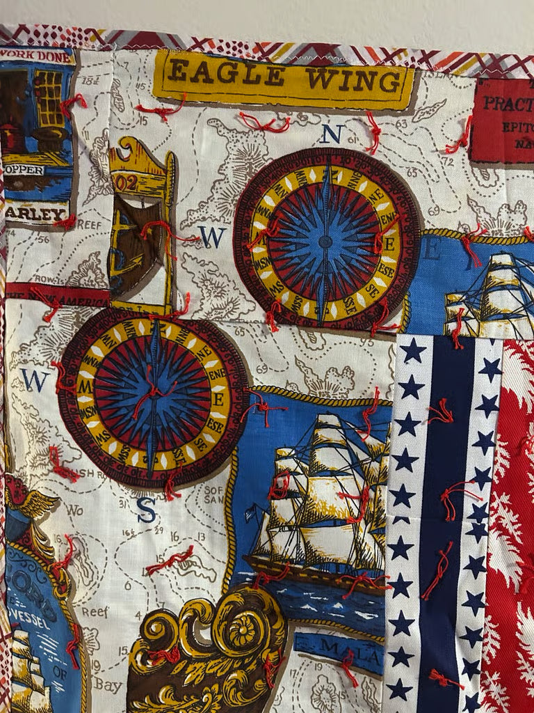 A vintage handmade quilt crafted on Fort Dodge Army Base by military wives 1970's